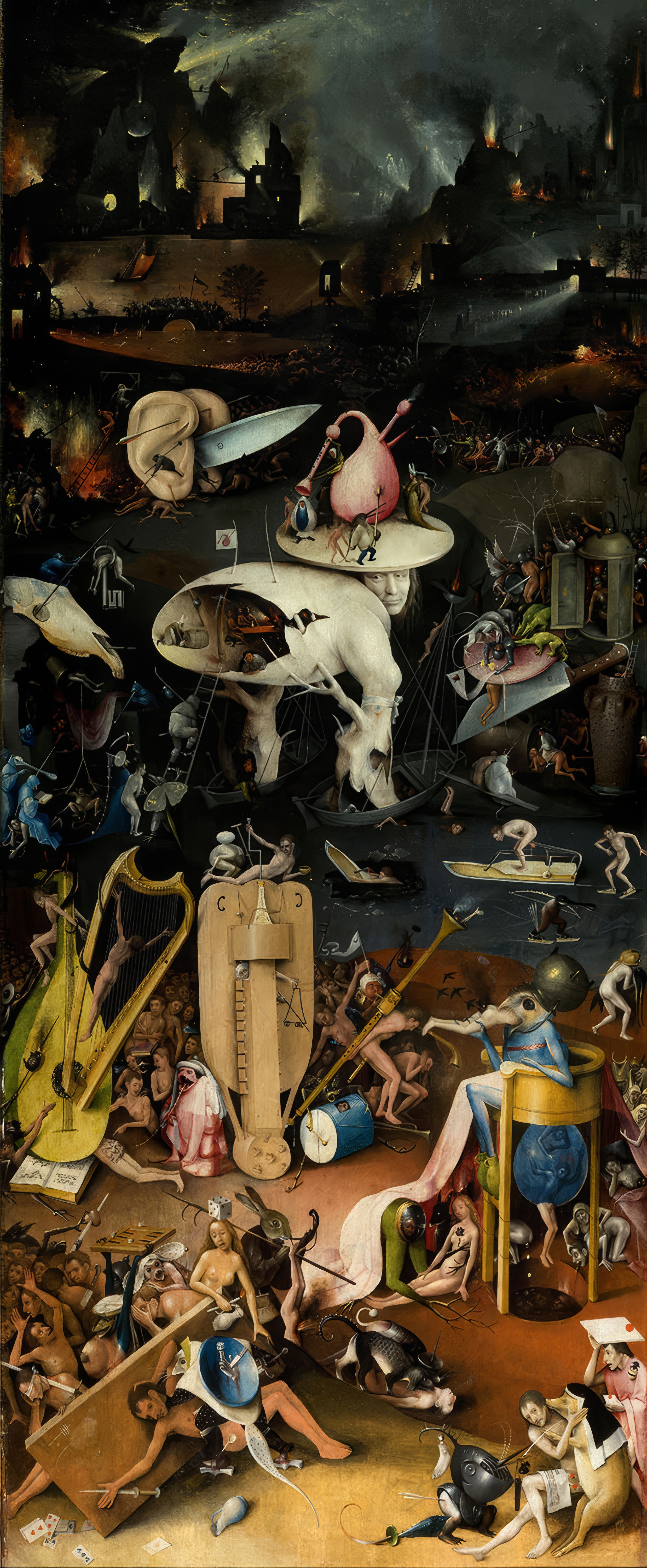 The right wing of Bosch's Garden of Earthly Delights: a dark hell with a burning city above and giant musical instruments used as instruments of torment below; the whole panel.