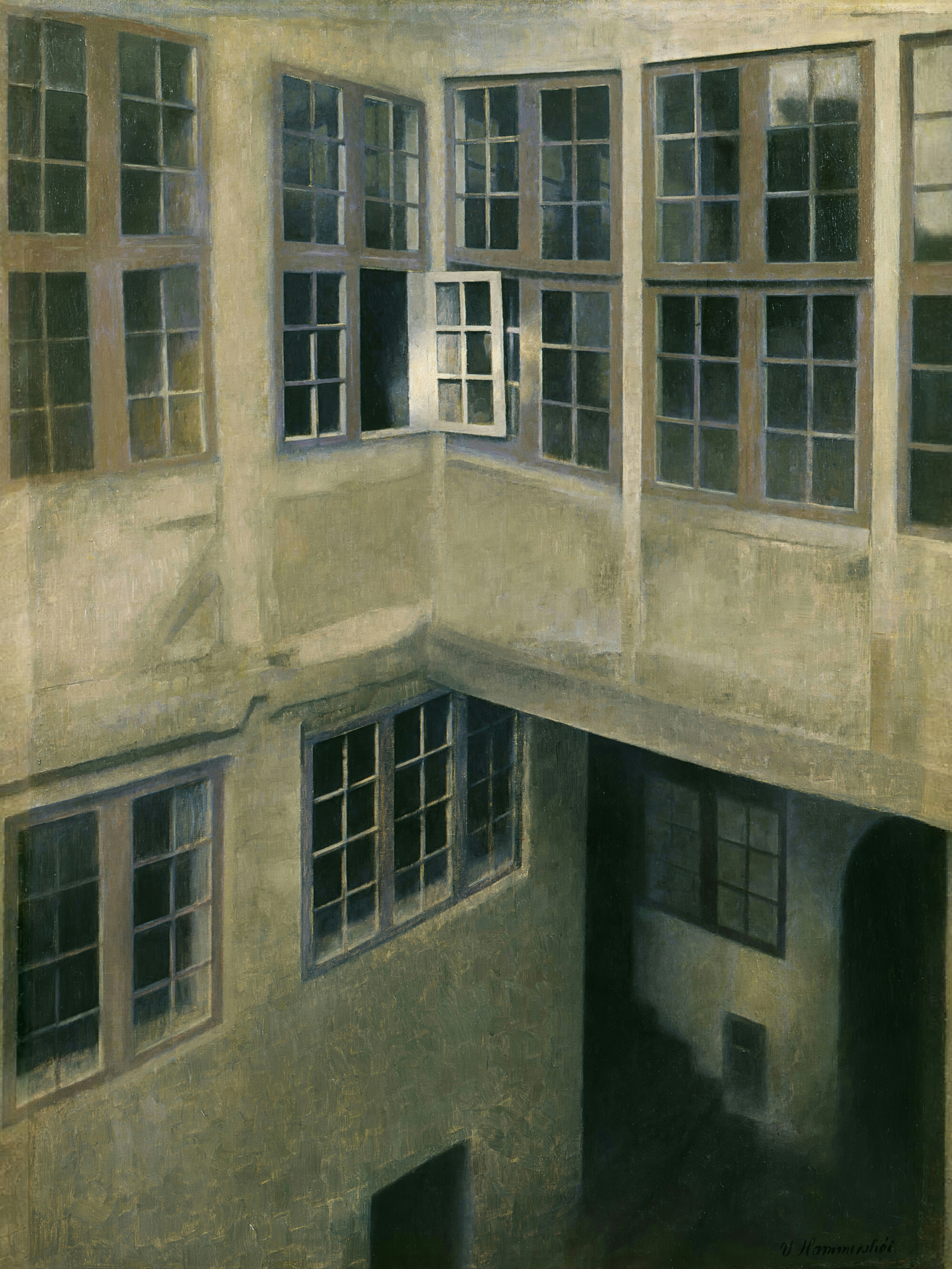 Tall courtyard walls with many paned windows, one open to the pale light.
