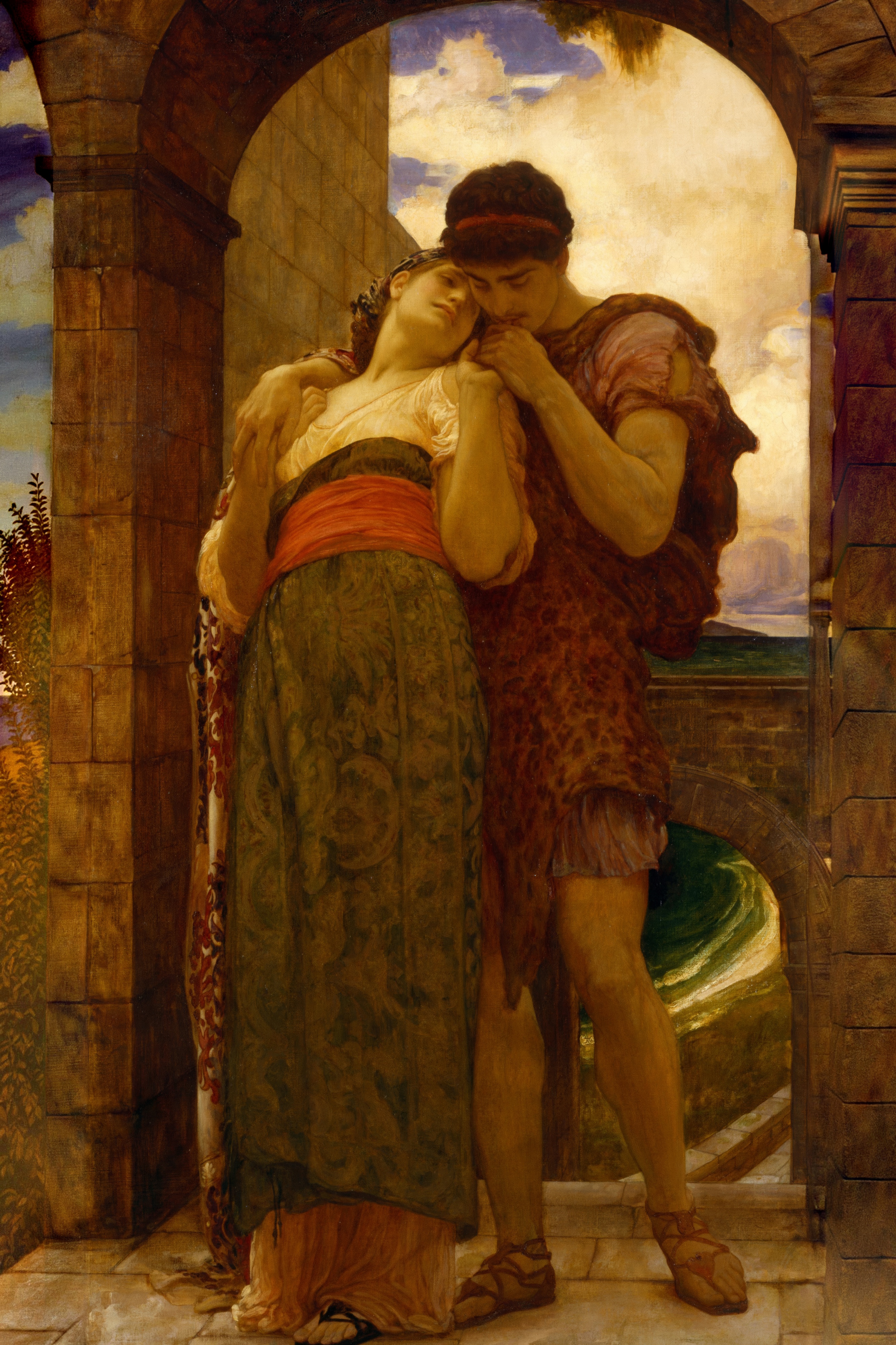 A young husband in a red tunic pressing his bride's hand to his lips as she leans against him with eyes closed, under a stone arch; painted by Frederic Leighton.