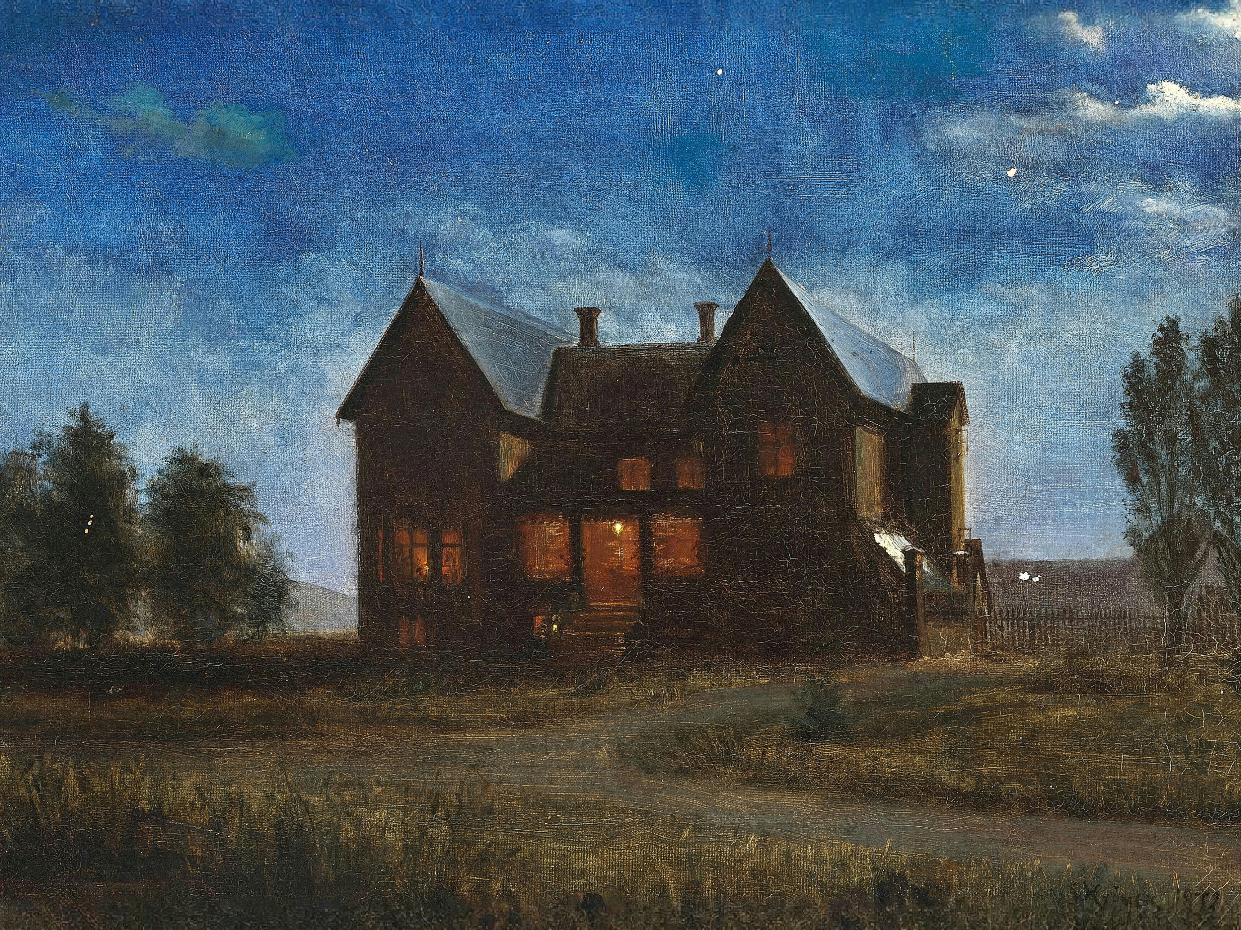 A gabled wooden villa under a deep blue night sky, its windows glowing orange.
