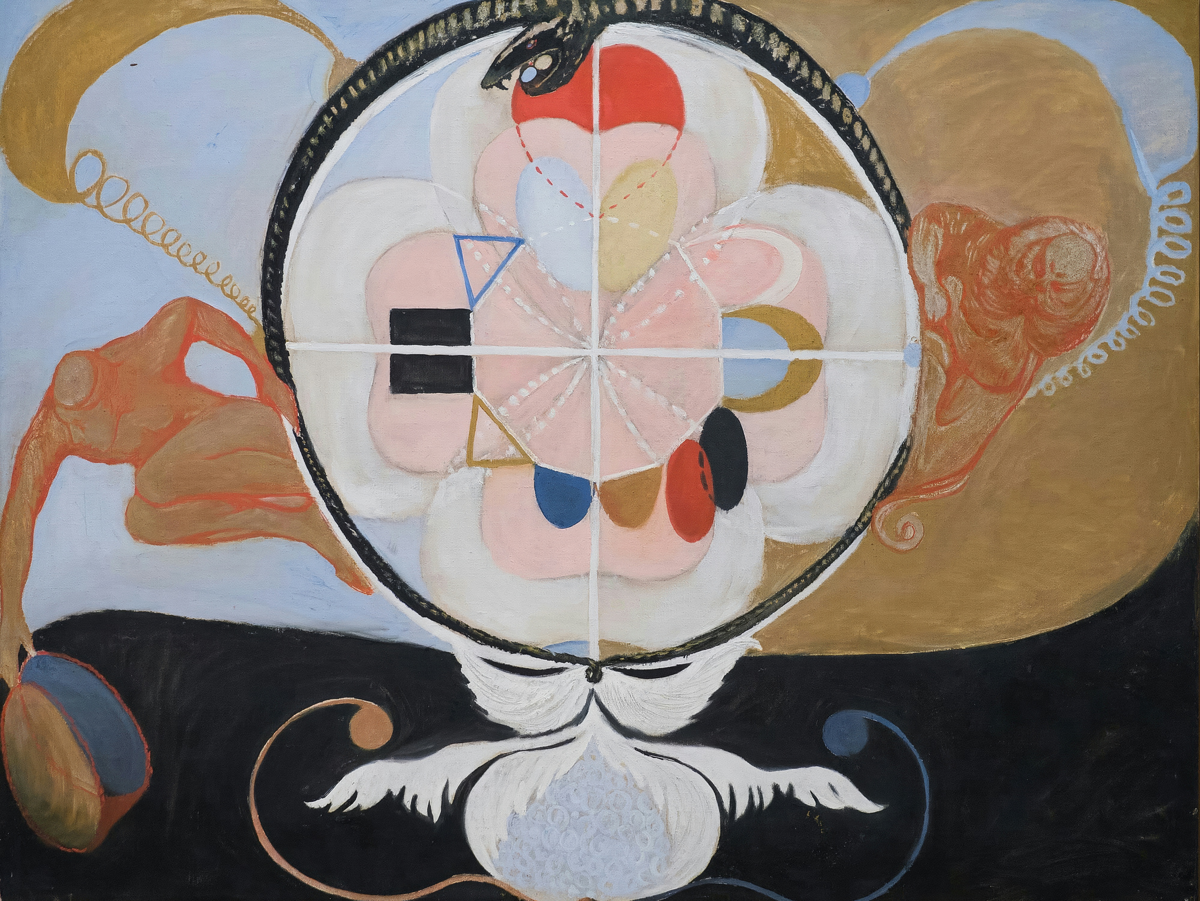 A pink and white flower-like form inside a ring held by a black serpent, between two red-gold figures and white wings.