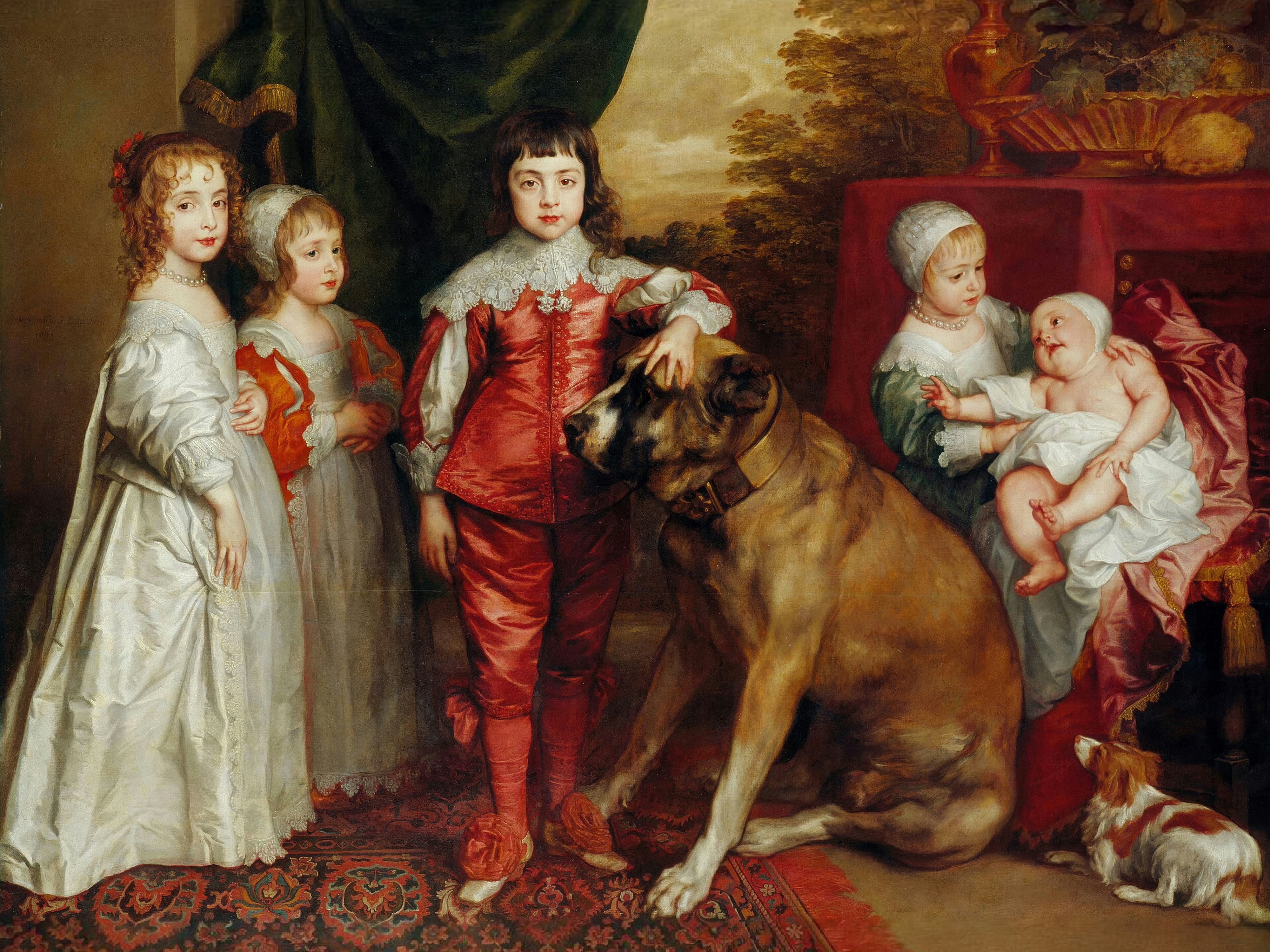 Five royal children in silk stand in a row; the eldest boy rests his hand on an enormous mastiff, and a small spaniel sits at the right.