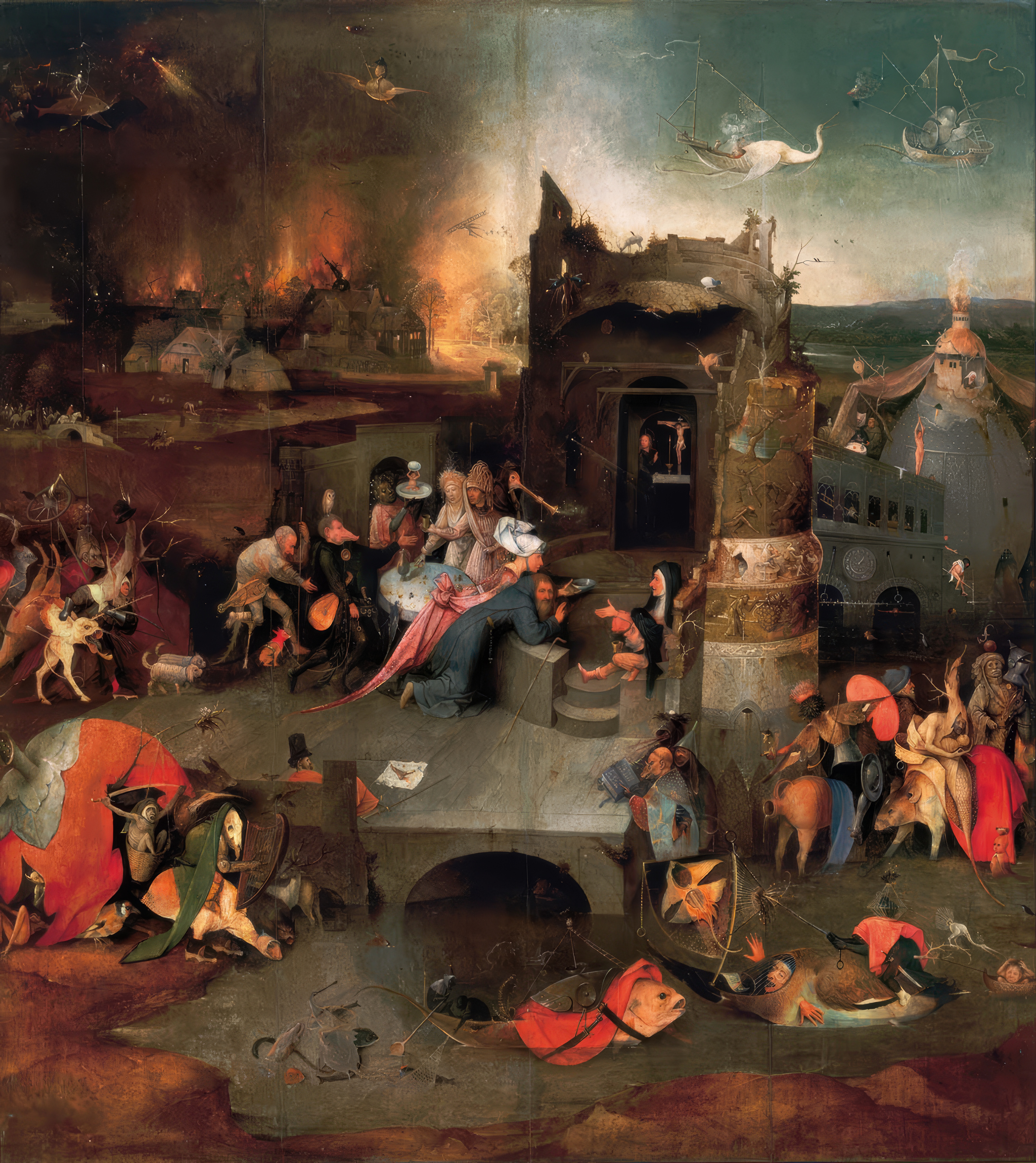 The centre panel of Bosch's Temptation of Saint Anthony: the saint kneeling by a ruined tower among demons and strange figures, with a burning village behind; the whole panel.