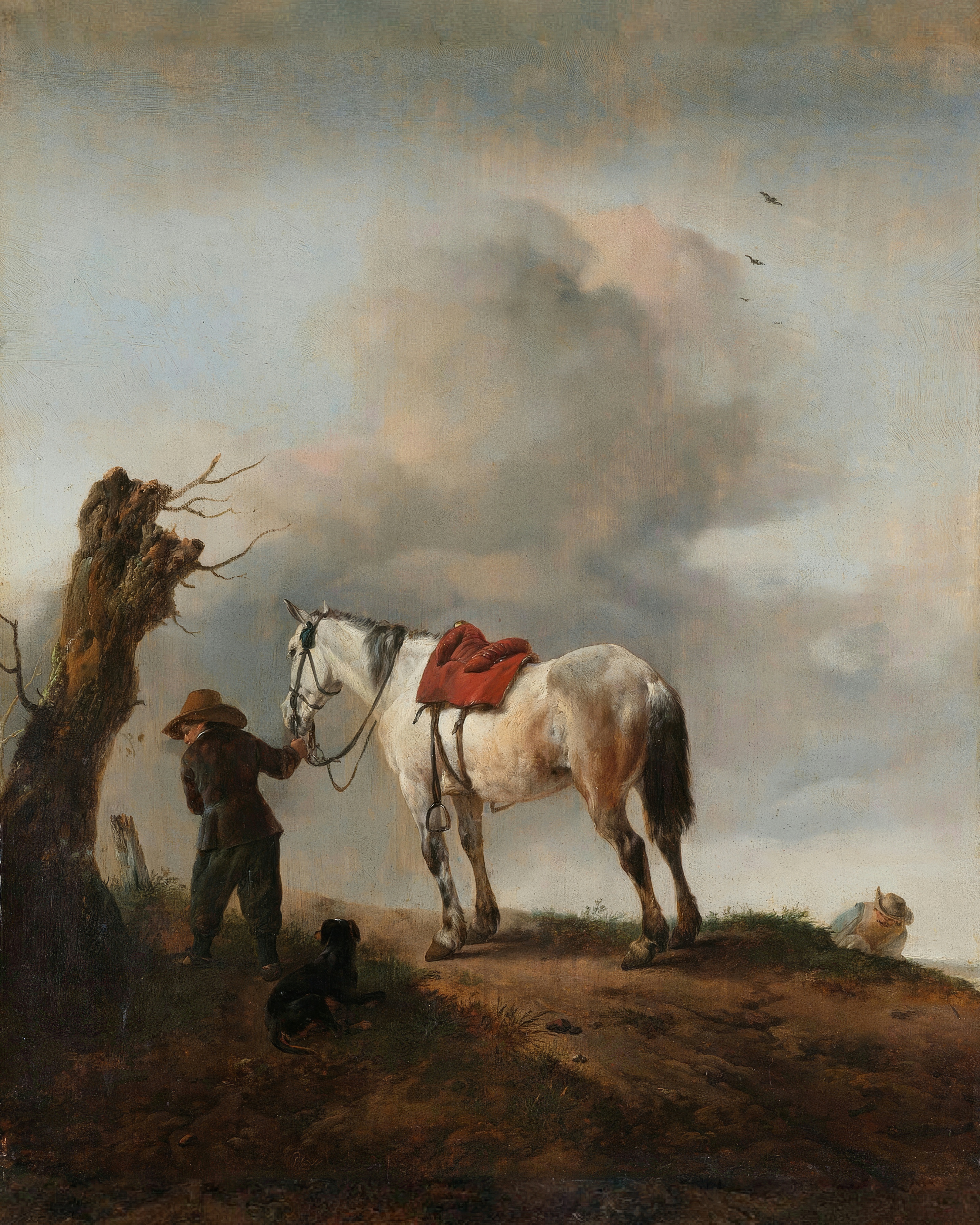 A man in a hat holds a saddled grey horse by a dead tree on a hill under a cloudy sky.