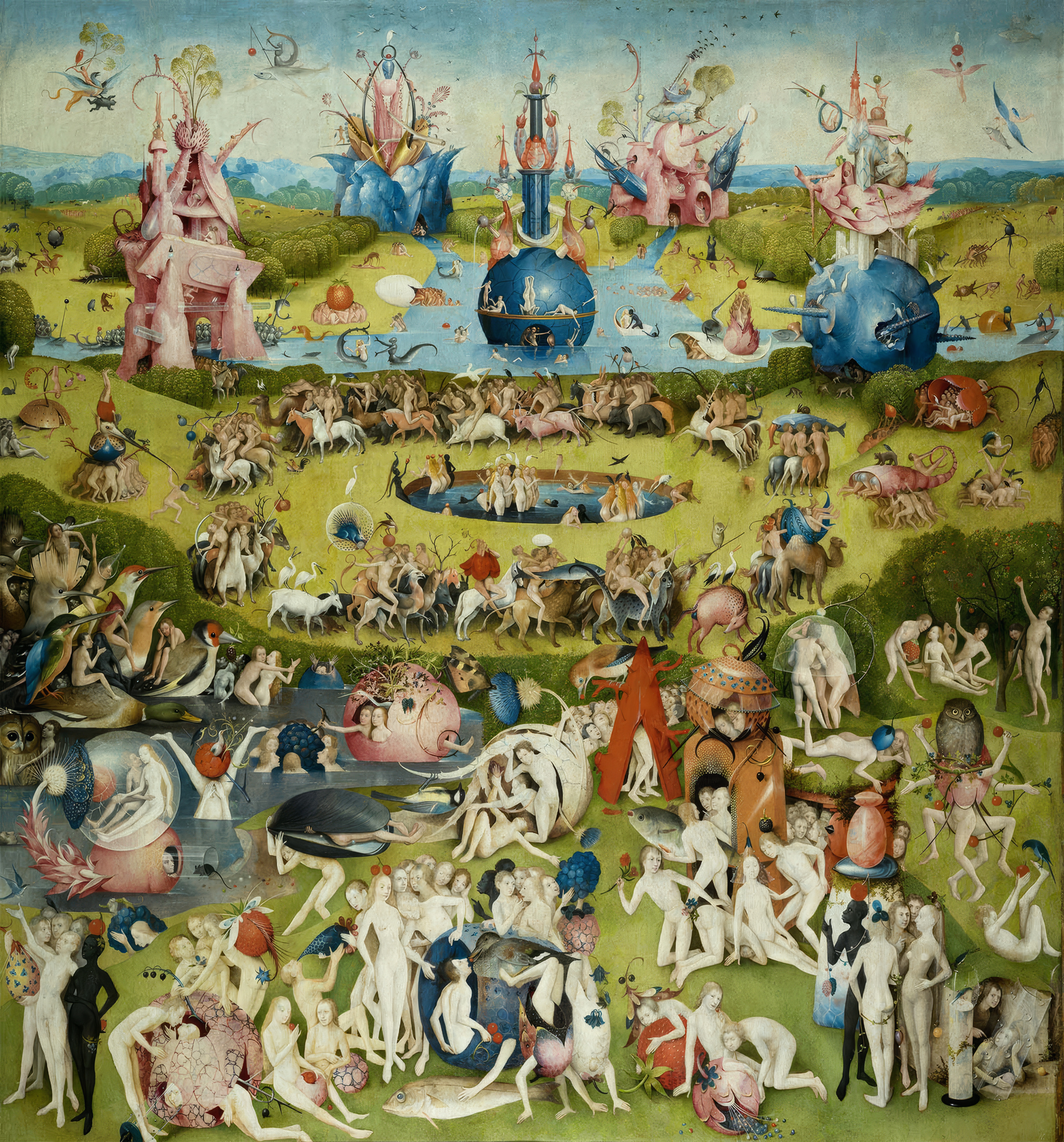 The whole centre panel of Bosch's Garden of Earthly Delights with fantastical towers, riders and crowds of figures.