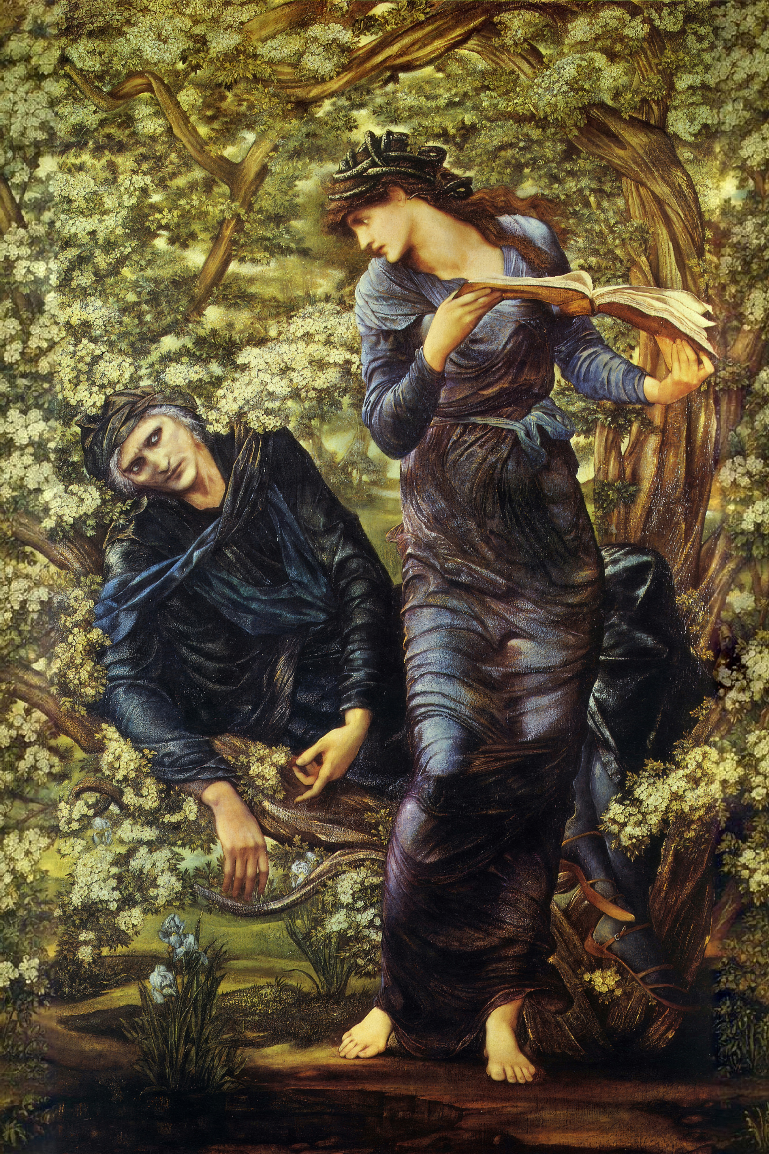 Nimue in a shimmering purple gown reads a spell over Merlin, who lies trapped in a flowering hawthorn.