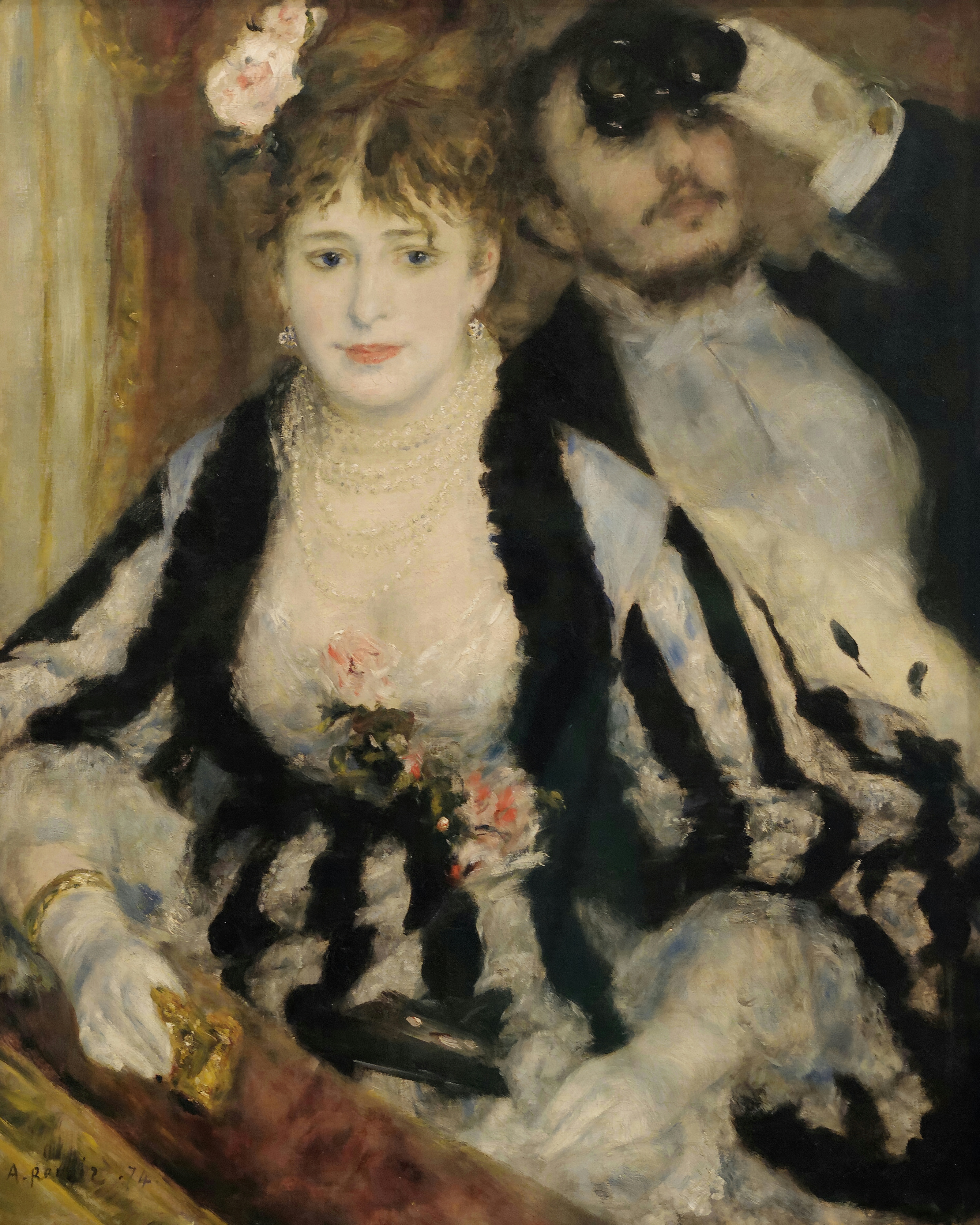 A young woman in a black and white striped gown with roses at her breast seated in a theatre box, a man behind her raising opera glasses; painted by Pierre-Auguste Renoir.