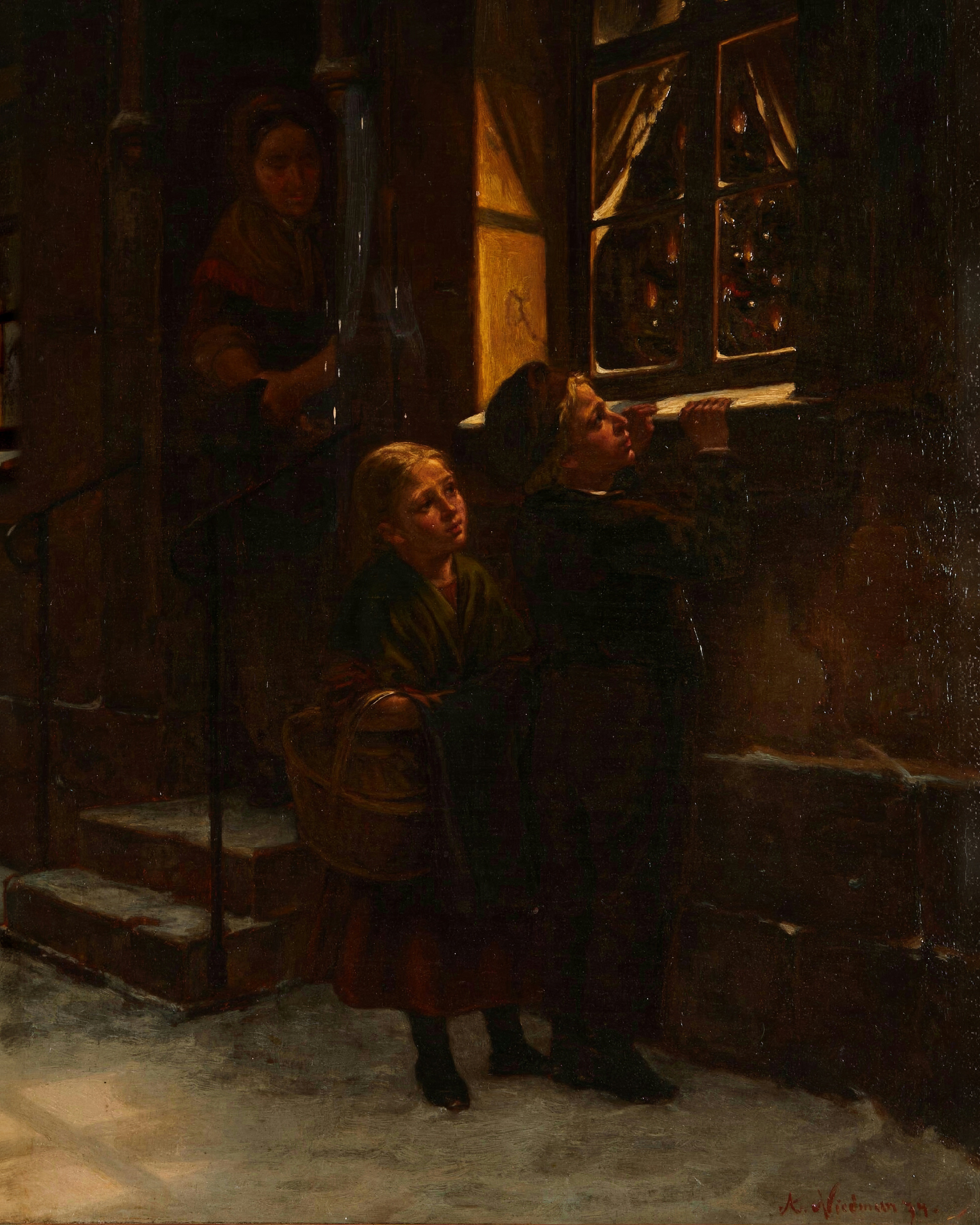 Two children stand in the dark street and look up at a window glowing with the light of a Christmas tree.