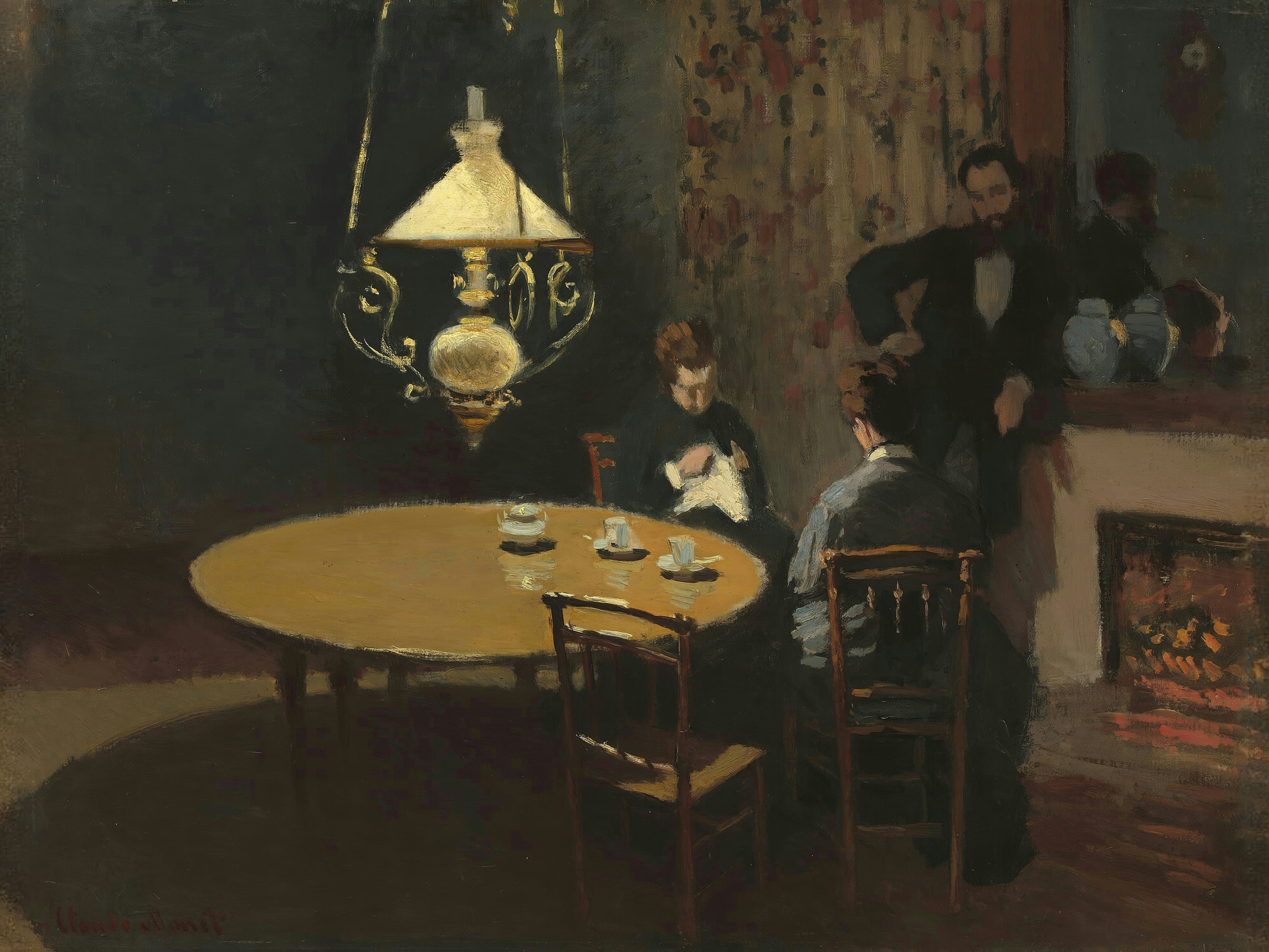 A hanging lamp lights a round table with coffee cups, where two women sew and a man stands by the fire.