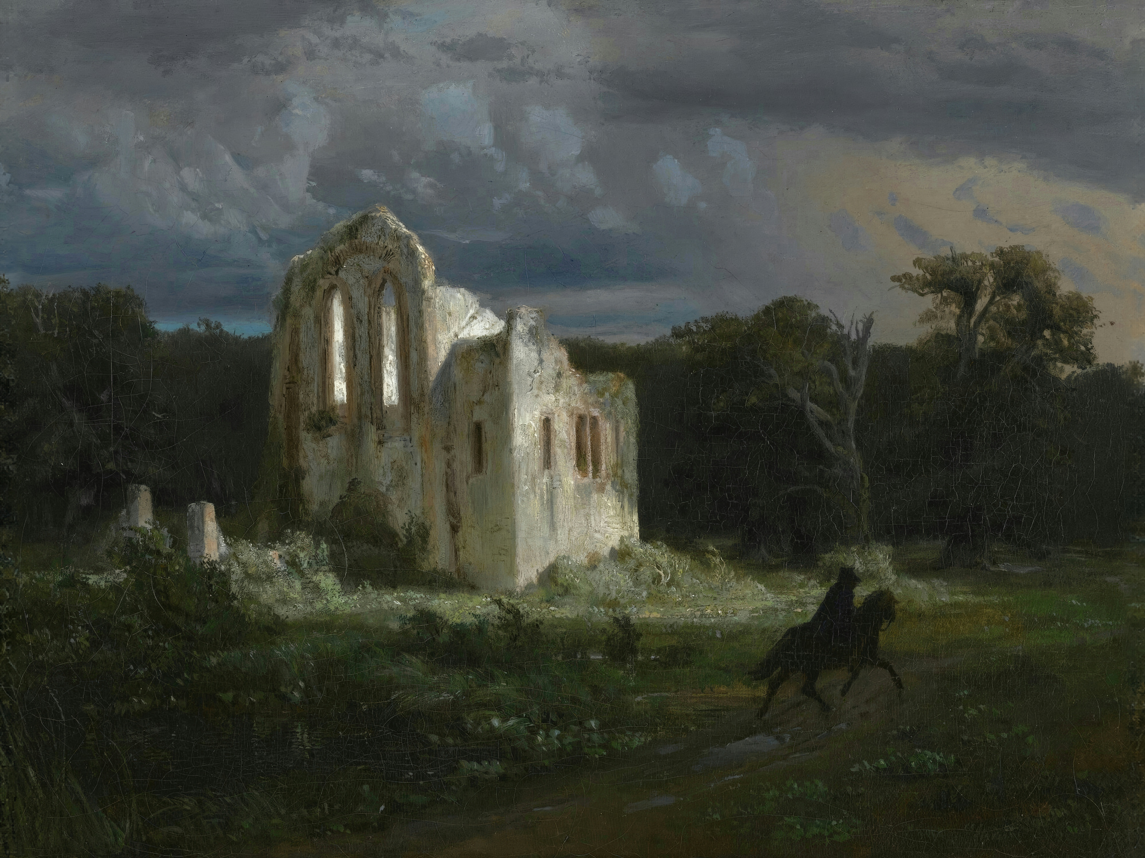 A hidden moon lights the ruined walls of a building under a stormy sky.