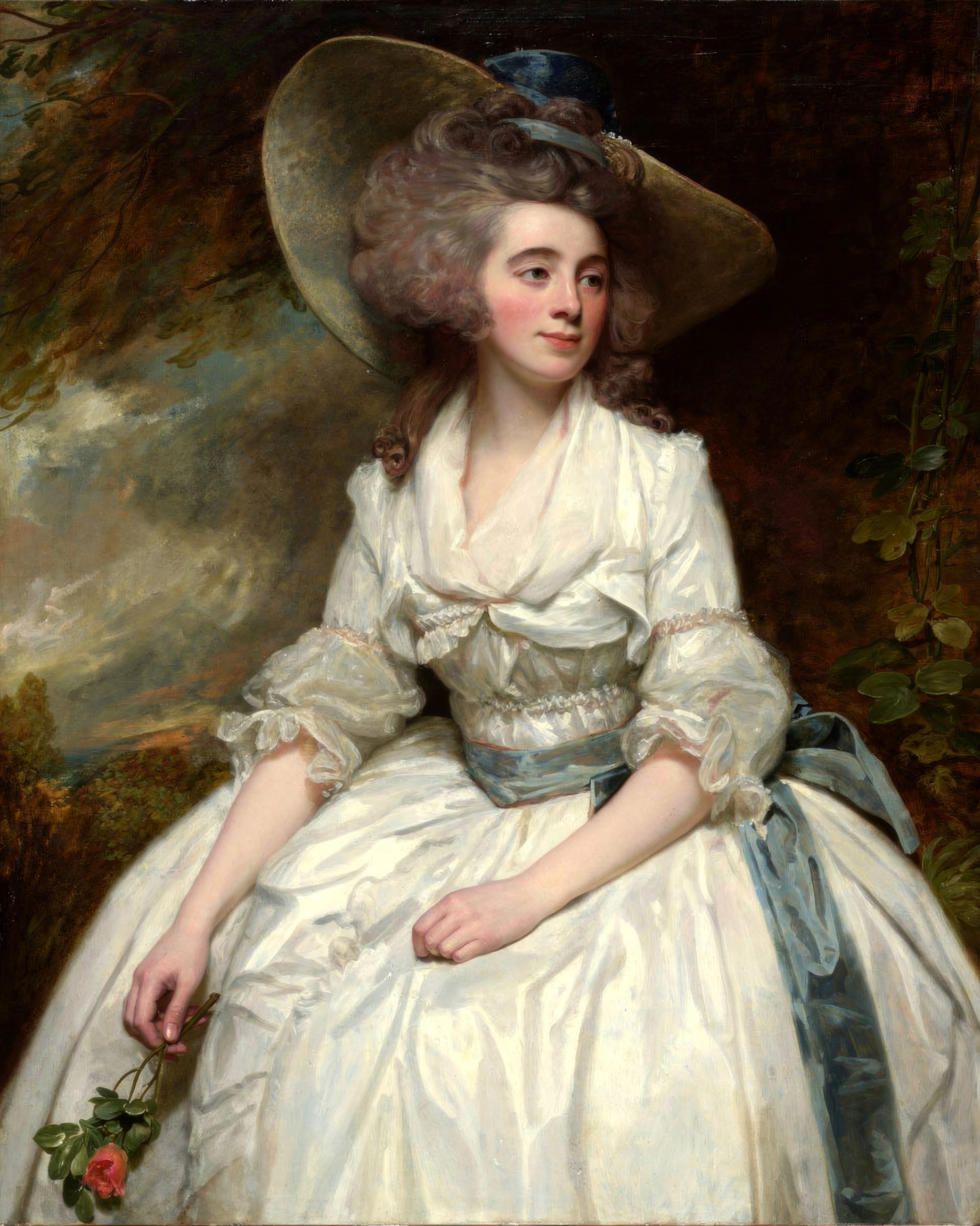 A woman in luminous white with a feathered hat, against a windswept sky.