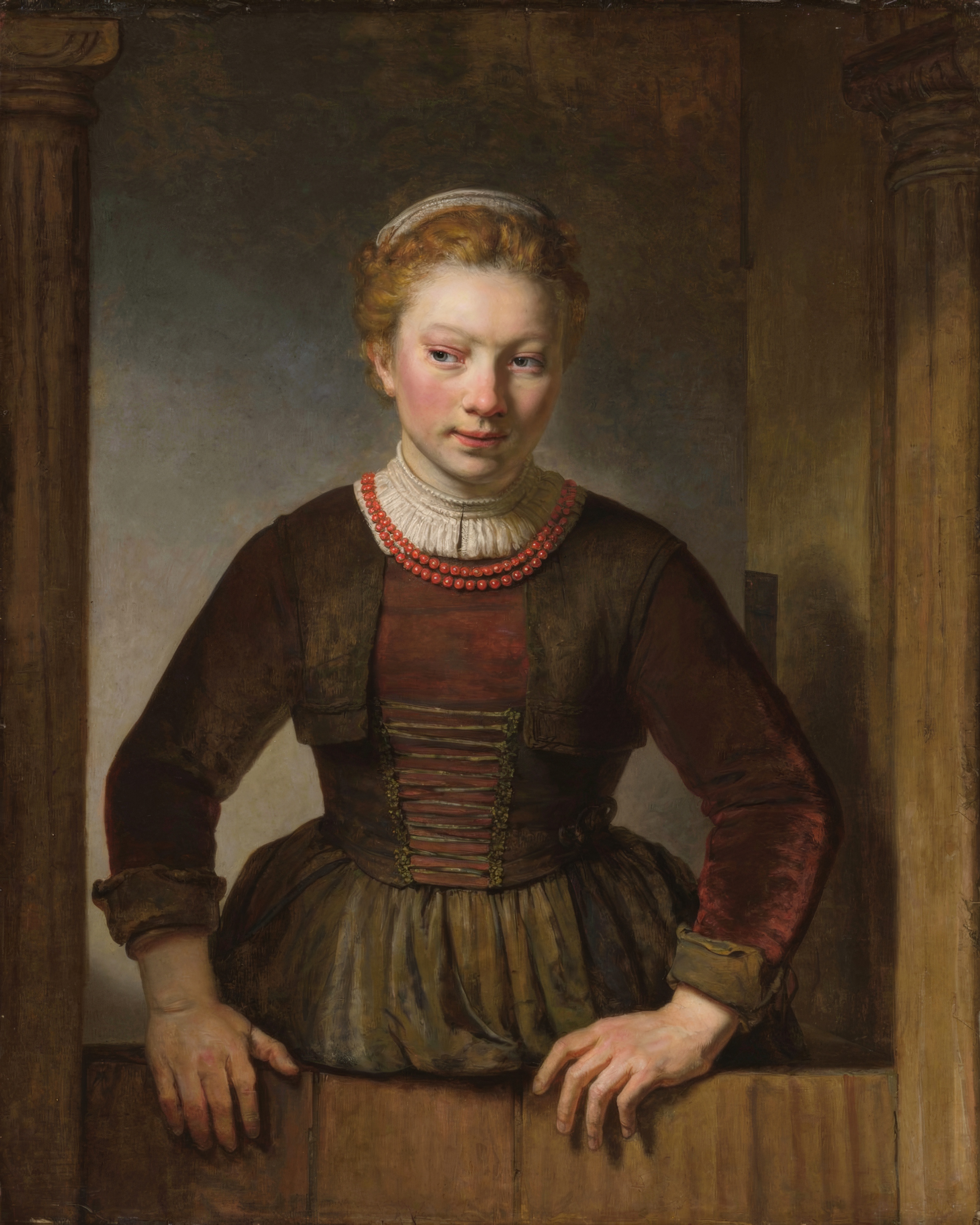 A young woman leans on the ledge of a half-open door, her face lit softly from the side.