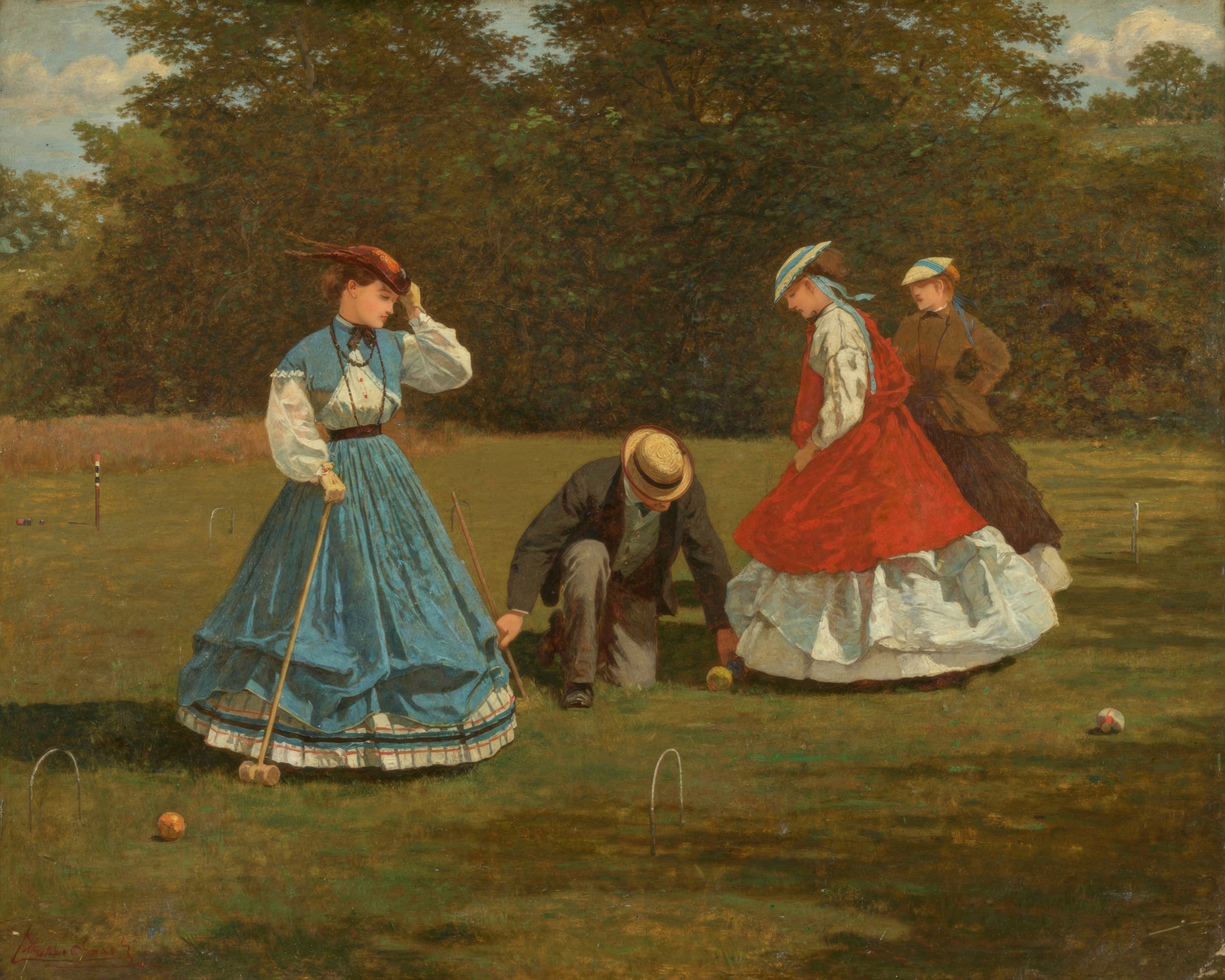 Women in bright dresses and a man play croquet on a sunny lawn.