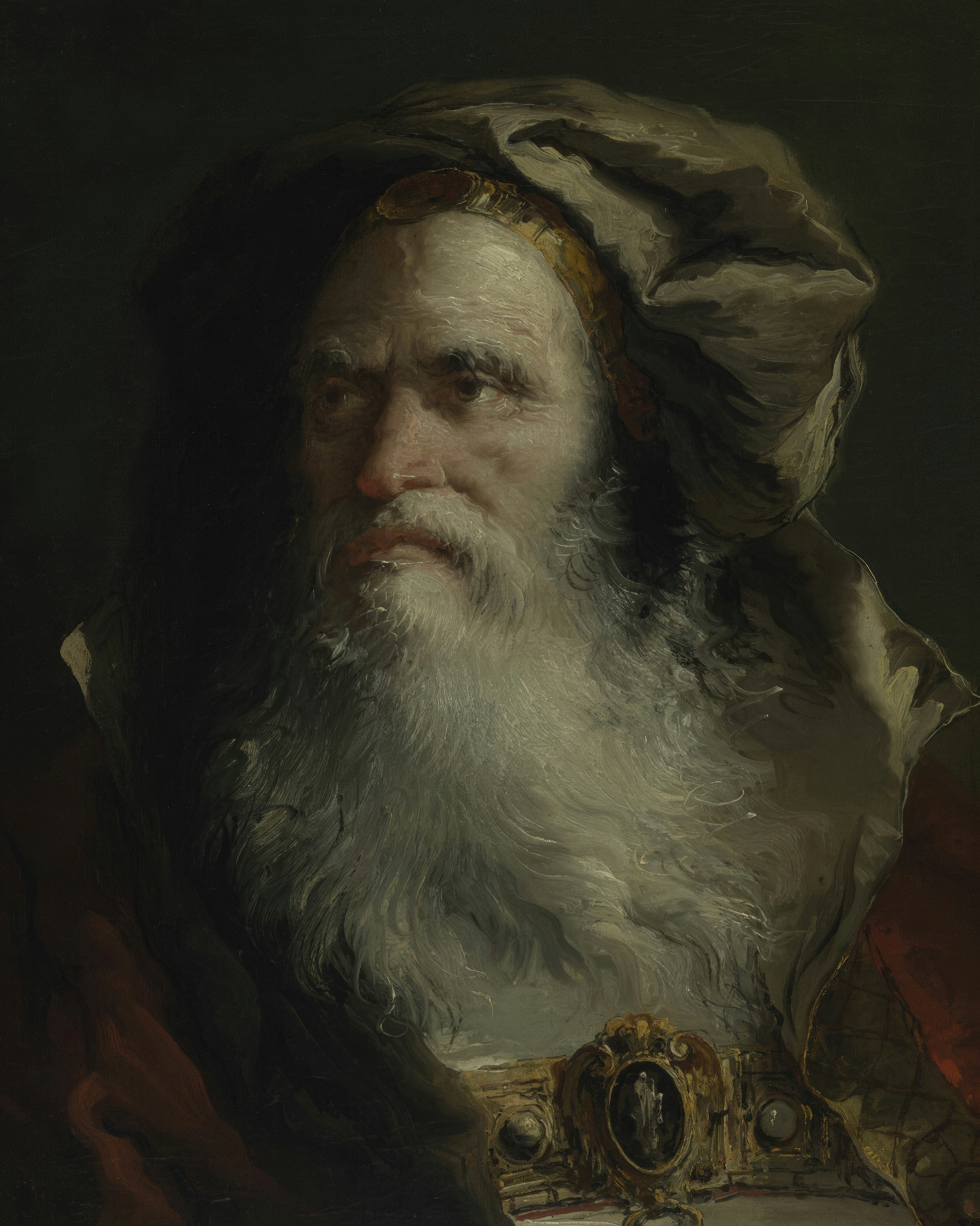 An old philosopher with a lined face looks away in thought, lit from one side.
