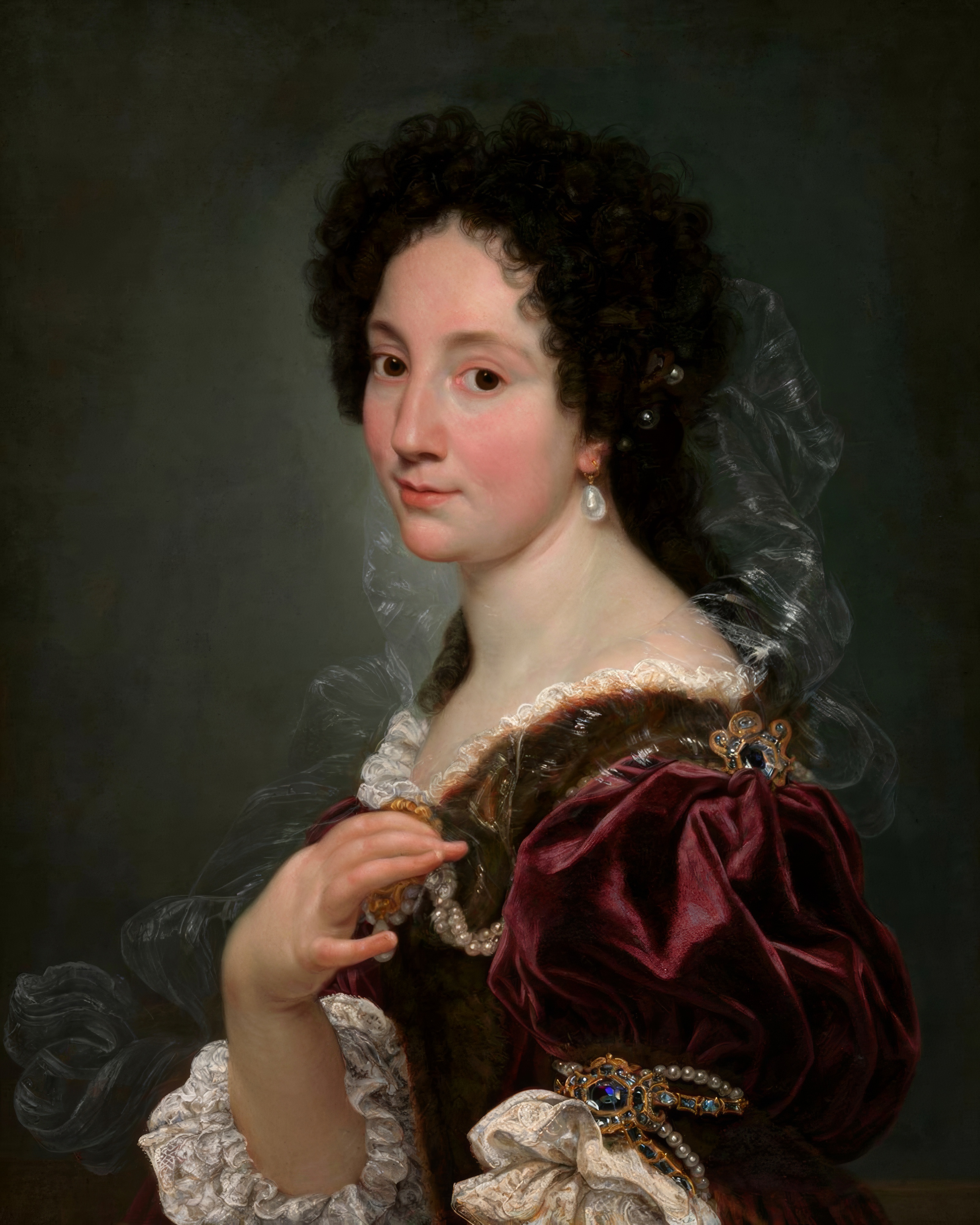 A woman in a wine red silk bodice and pearls turns to meet our gaze.