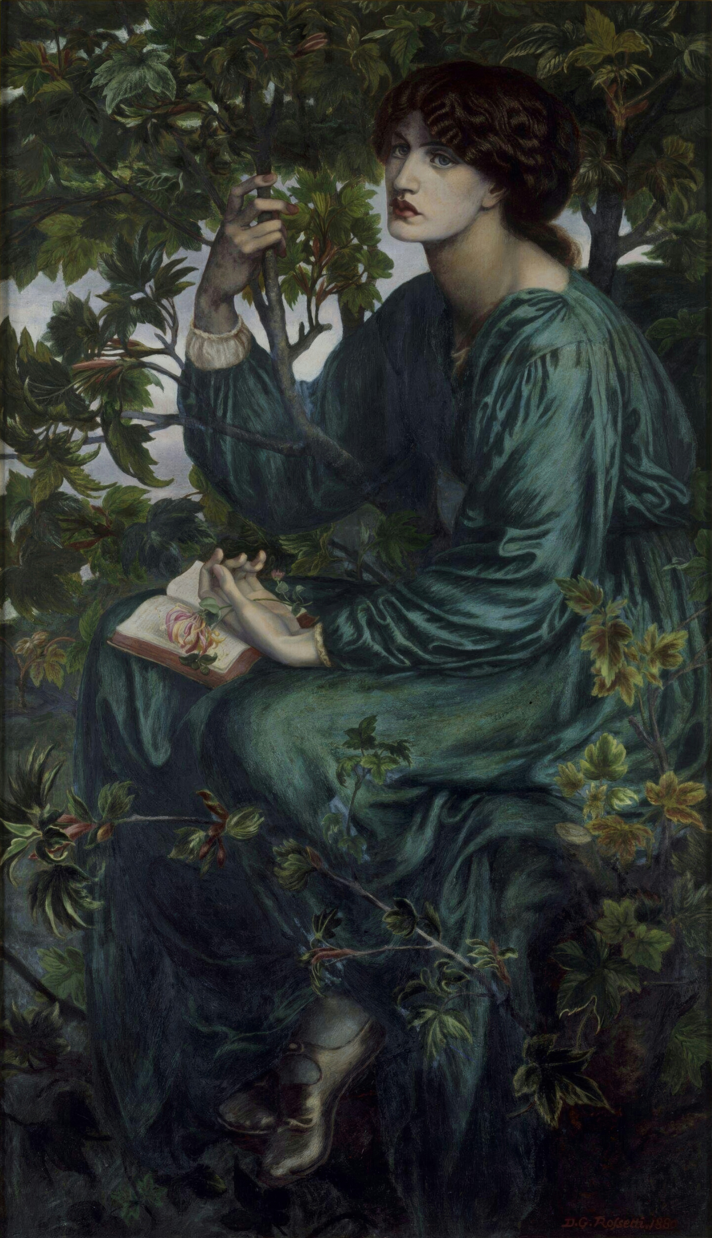 A woman in a green dress sits among the leaves of a tree holding a sprig of honeysuckle, a book in her lap.