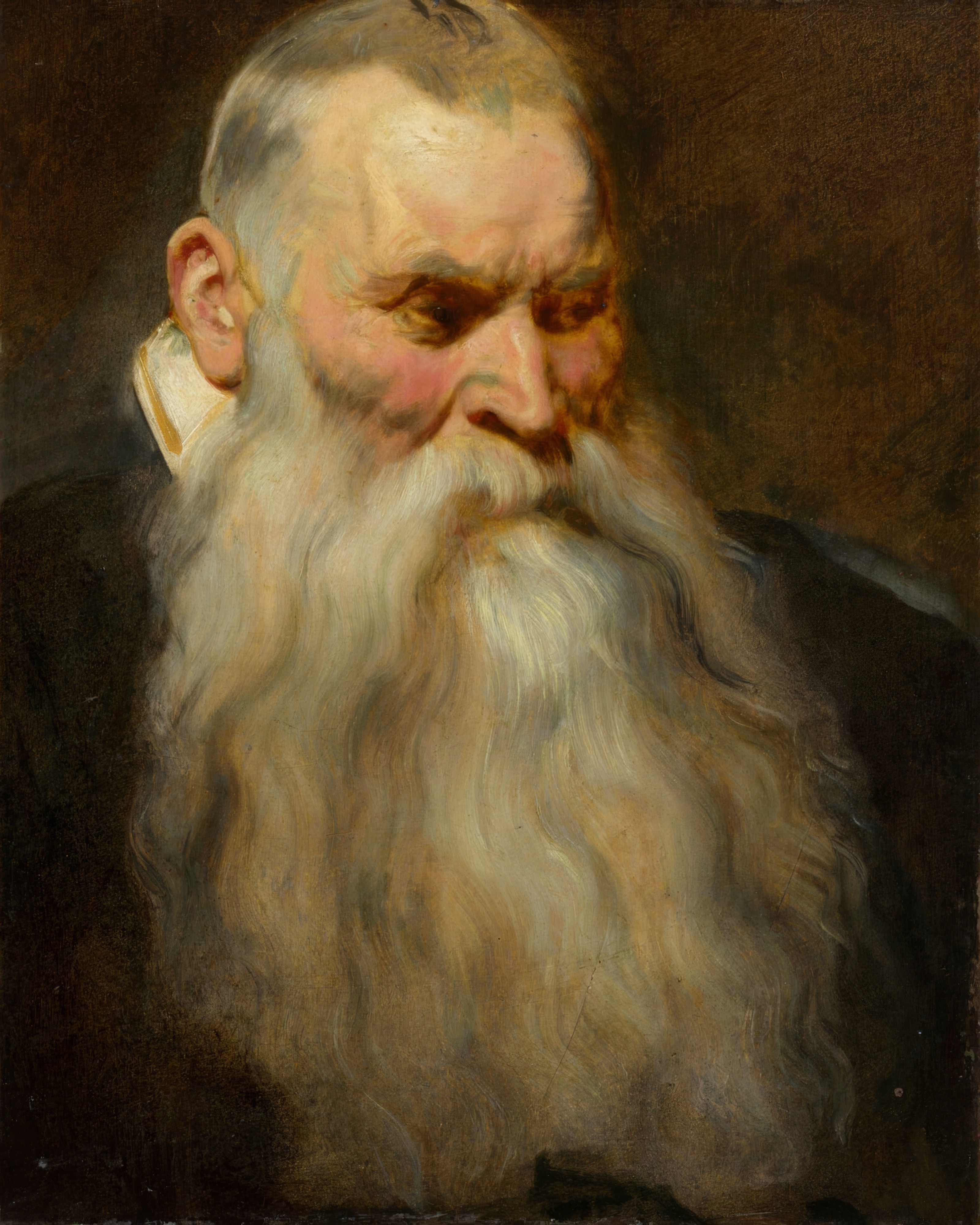 An old man with a white beard, his brow lit from the side against a dark ground.