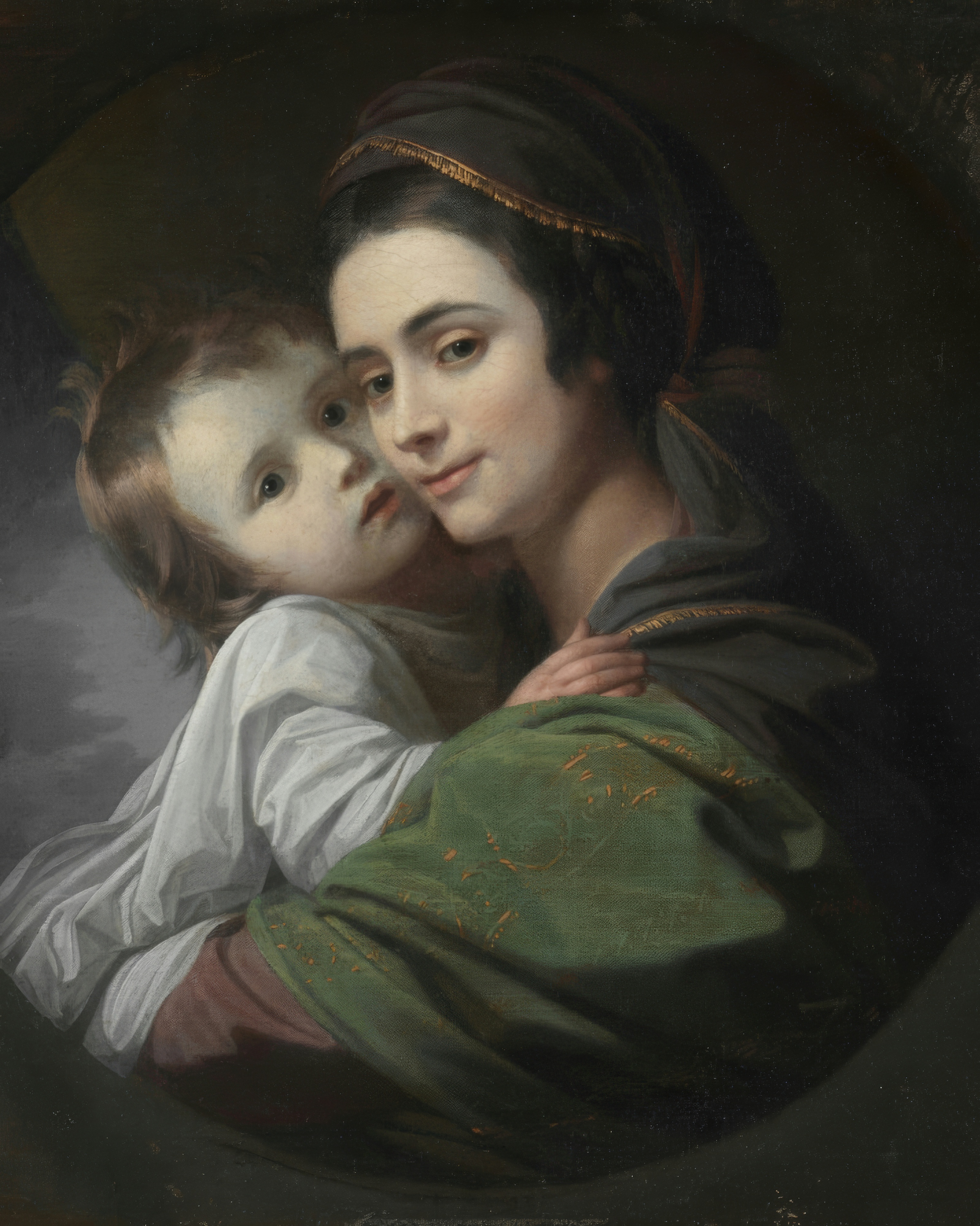 Elizabeth West cradles her infant son wrapped in white linen and looks warmly at the viewer.