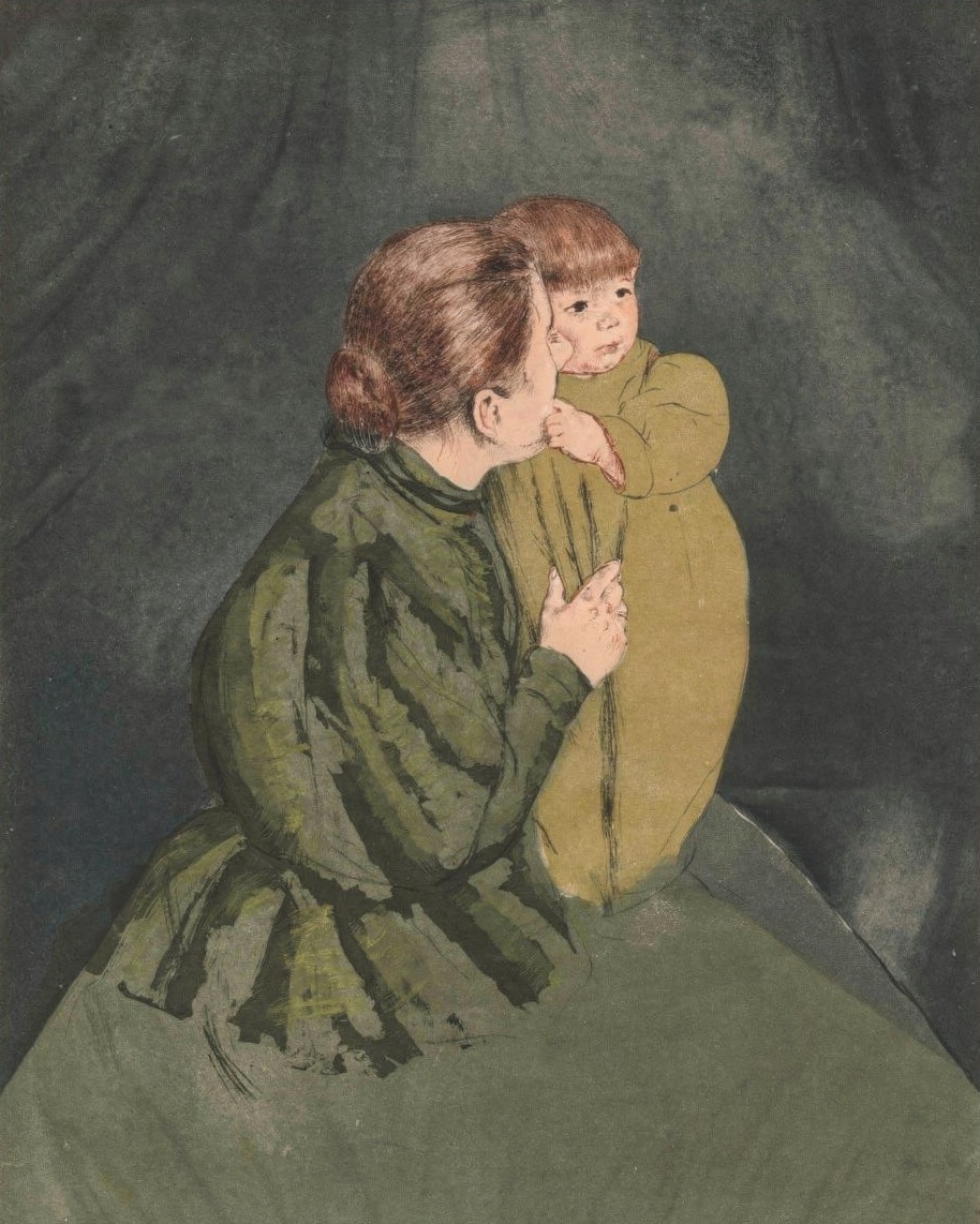 A mother in a green and yellow dress holds her small child close, their heads together.