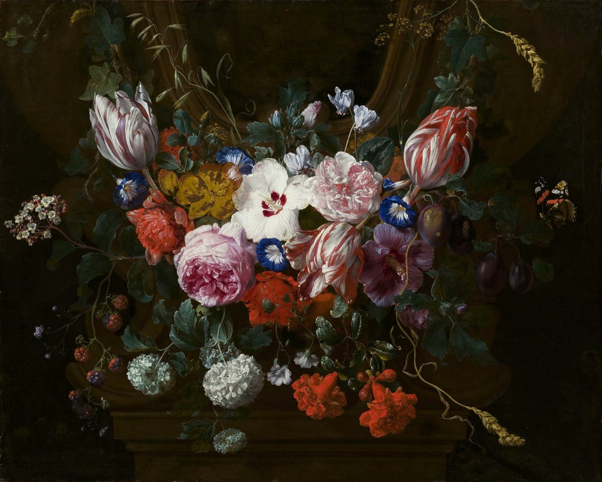 A bouquet of striped tulips, carnations and roses hangs beneath a carved stone cartouche.