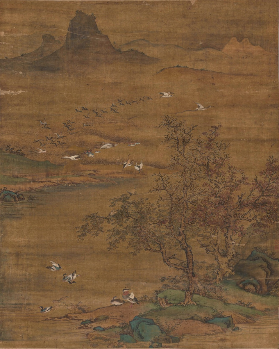A flock of wild geese rises over a reedy marsh.