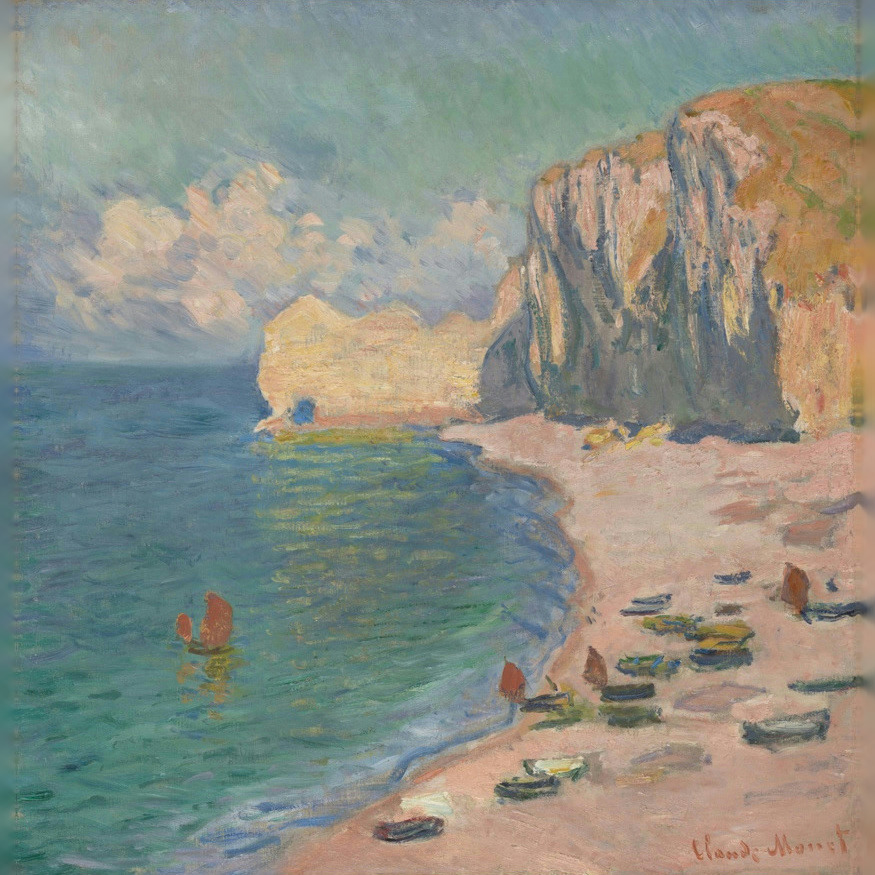 Monet’s Étretat beach and Falaise d’Amont: pale cliffs beside a curved beach with boats and green-blue water, shown whole.