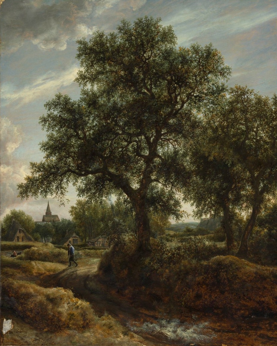 A sandy road winds over dunes past a few trees toward a distant village, under a tall sky with grey clouds.