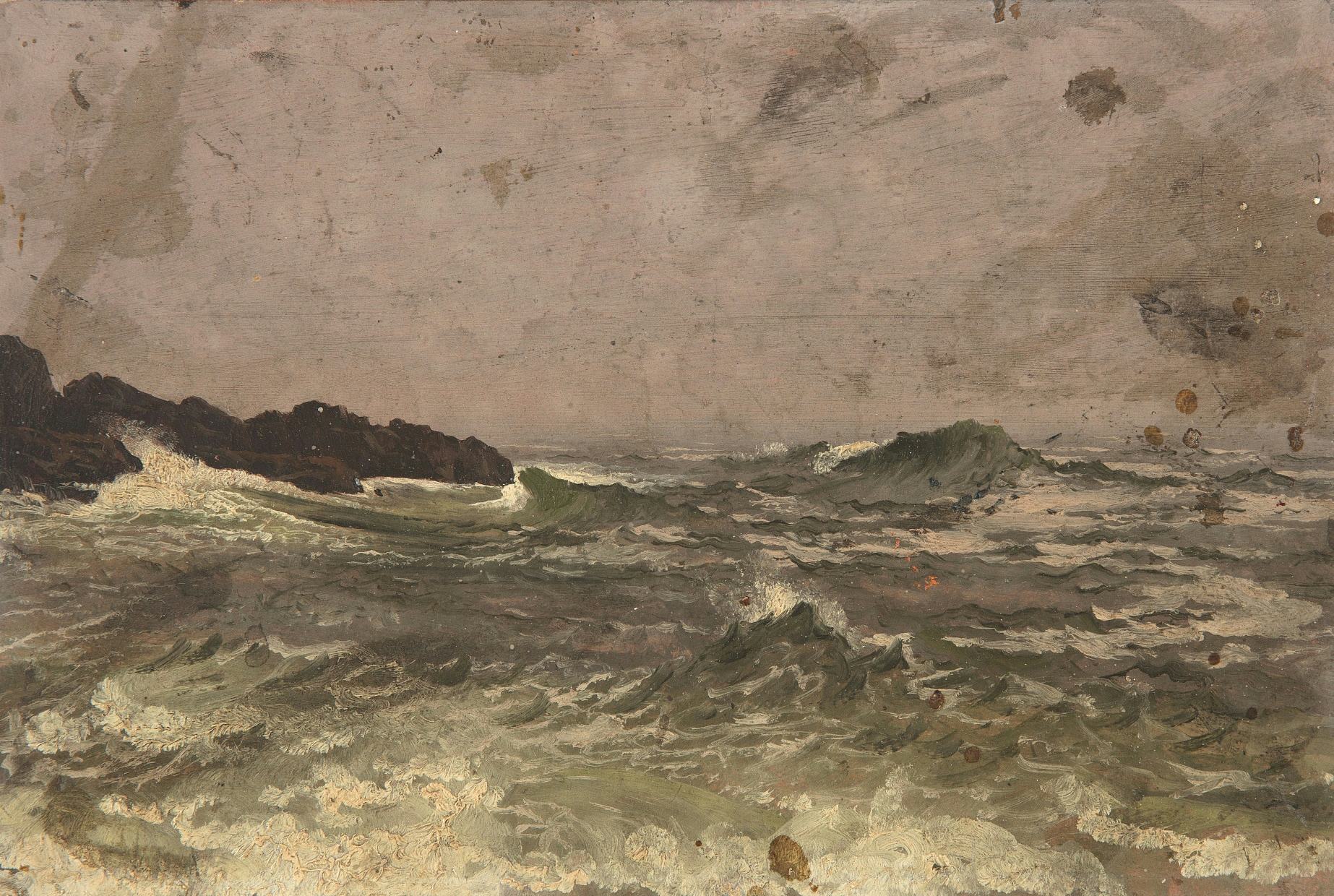 Waves crash against a rocky shore as the sun sets through heavy clouds in gold and rose.